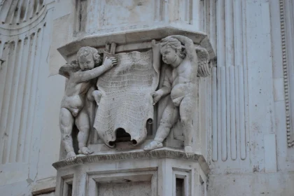 Cherubic Stone Relief Sculpture