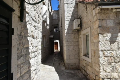 Sunlit Stone Alley