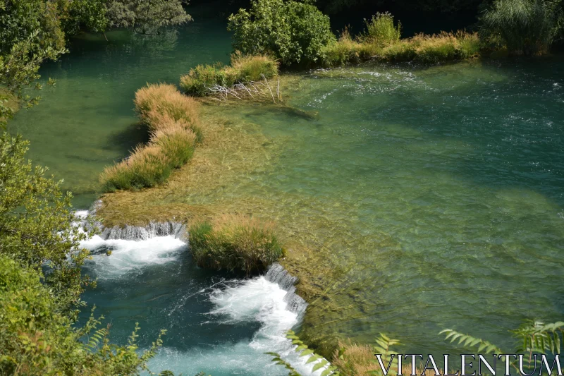 PHOTO Calm River with Waterfall and Green Surroundings