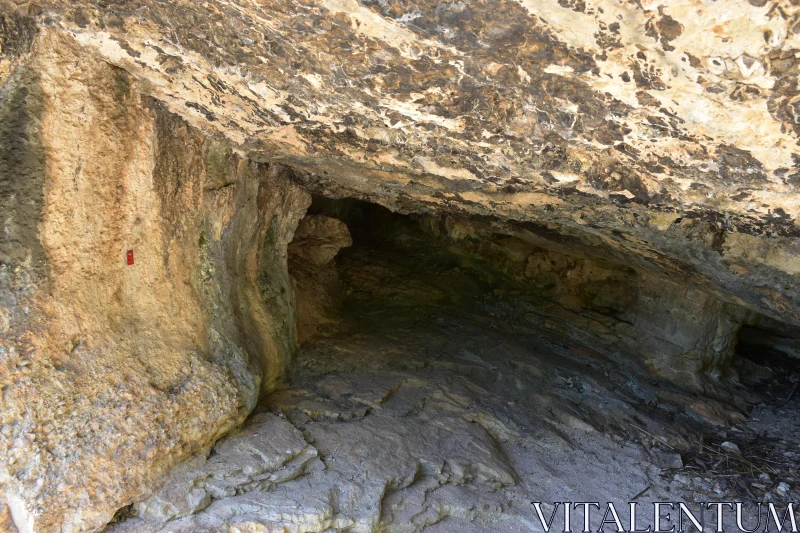 Natural Cave with Textured Rock Formations Free Stock Photo