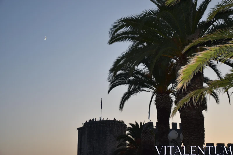 PHOTO Croatian Dusk with Crescent Moon and Tower