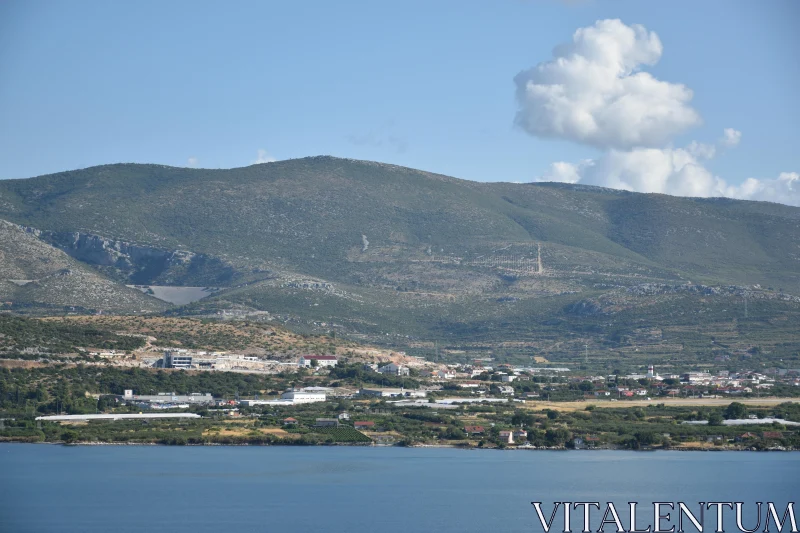 PHOTO Scenic View of Mountains and Sea