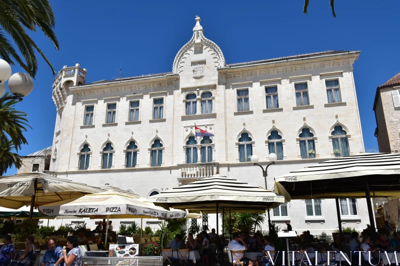 Croatian Marble Building and Outdoor Cafe Free Stock Photo