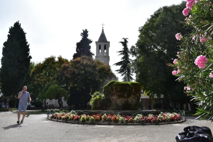 Picturesque Urban Garden with Stone Tower