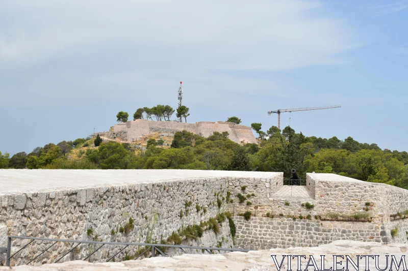 Hilltop Fortress Amidst Greenery Free Stock Photo