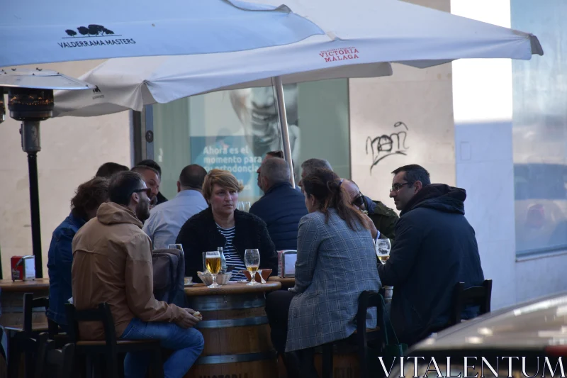 PHOTO Socializing at an Outdoor Cafe