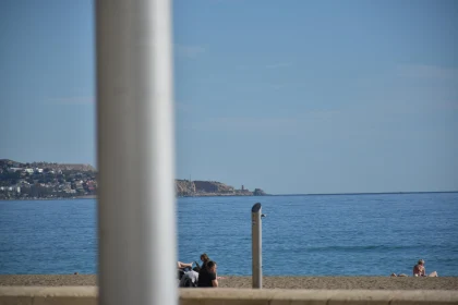 Quiet Beach Stretch with Ocean Horizon