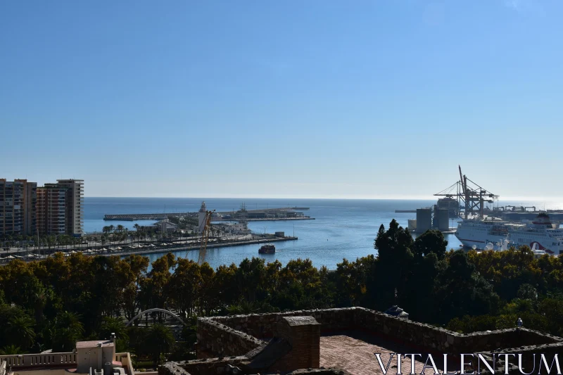 Malaga Cityscape Featuring Harbor and Sea Free Stock Photo