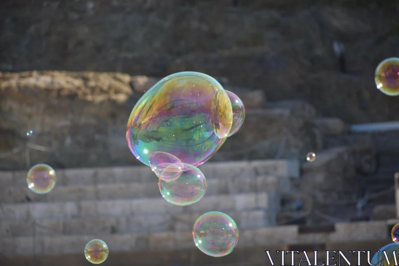 Floating Soap Bubbles Against Stone Background Free Stock Photo