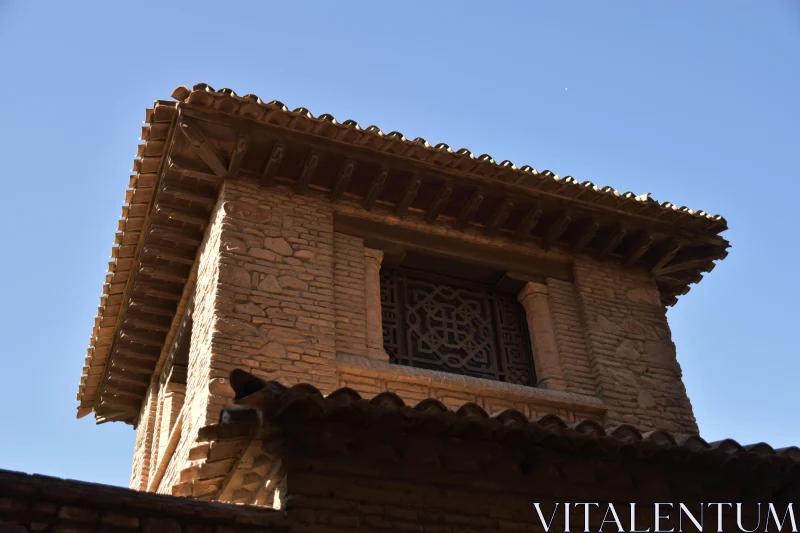 PHOTO Ornate Brick Architecture Against Blue Sky