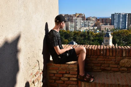 Person Overlooking Cityscape