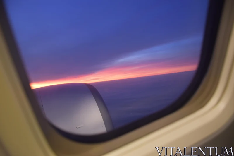 PHOTO Sunset from Airplane Window