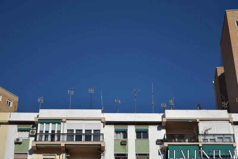 City Rooftops with Antennas Free Stock Photo