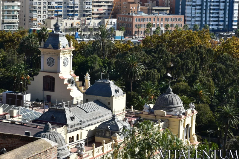 Historic Domes and Clock Tower Amidst City Free Stock Photo