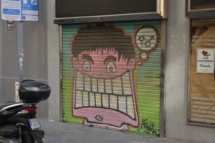 Playful Street Mural with Cartoon Face