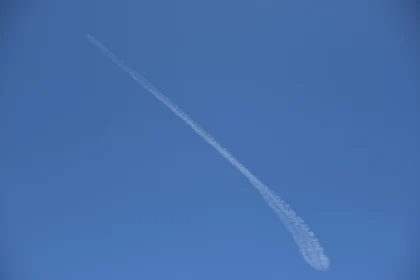 Contrail Across Blue Sky