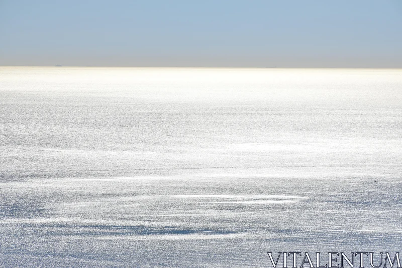 PHOTO Peaceful Beach with Glimmering Sea