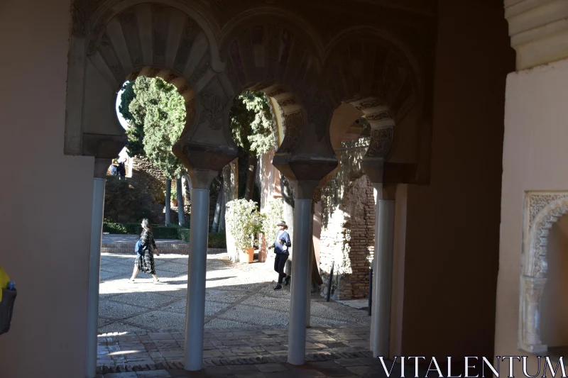 PHOTO Historic Spanish Courtyard with Arches