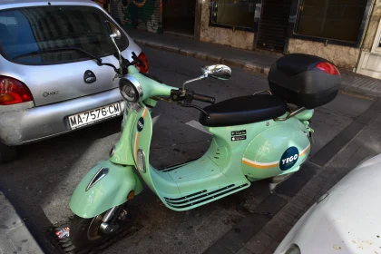 Retro Mint Green Scooter in Urban Setting