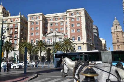 City Life in Malaga with Horse-Drawn Carriage