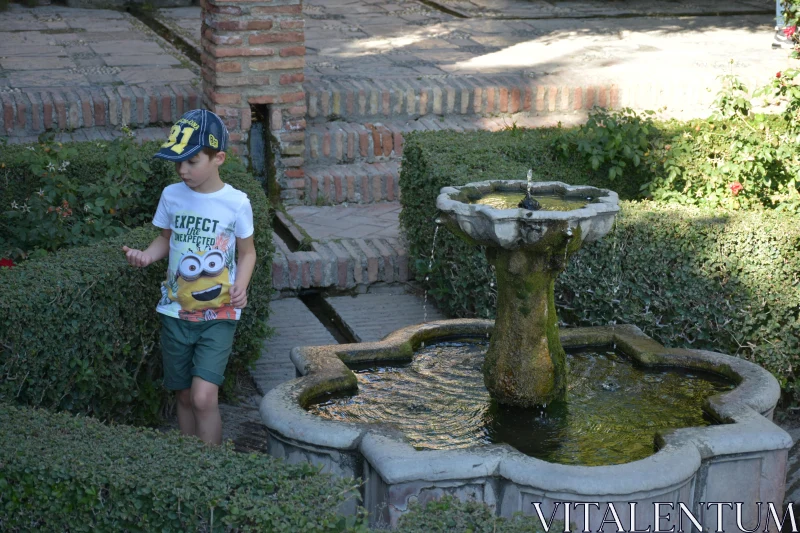 PHOTO Tranquil Garden with Child and Fountain