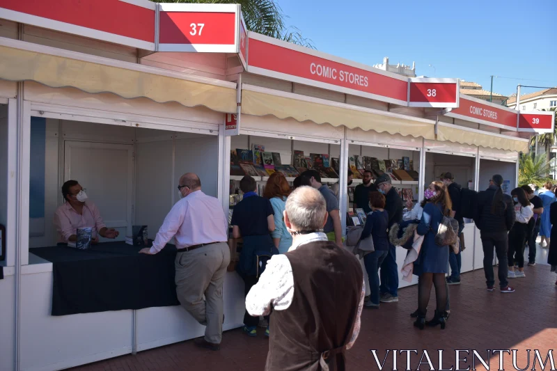 Comic Book Market with Stalls and Customers Free Stock Photo