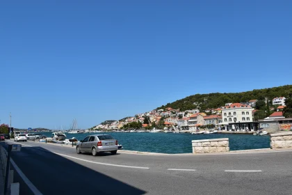 Serene Coastal Road and Harbor