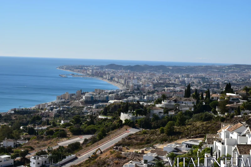 PHOTO Scenic View of a Coastal City and Beachfront