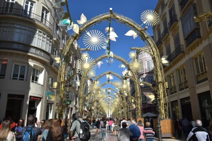 Malaga's Festive Street under Blue Skies