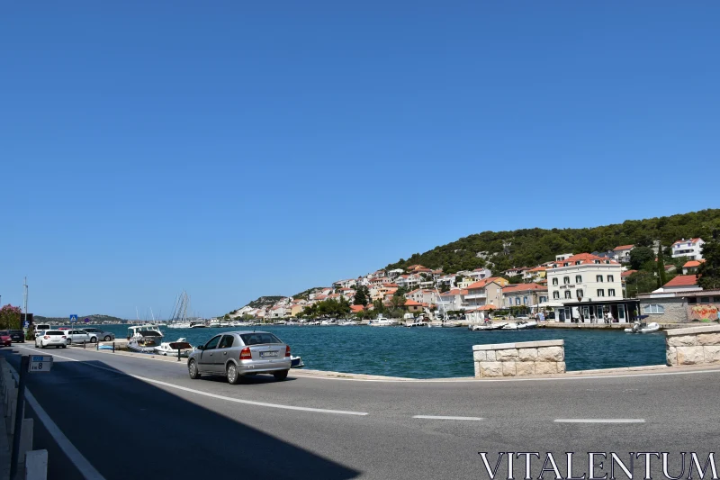 PHOTO Serene Coastal Road and Harbor