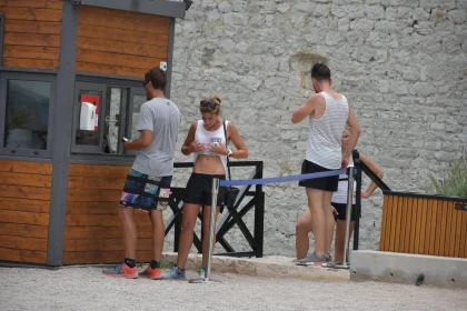 Group at Ticket Booth in Summer