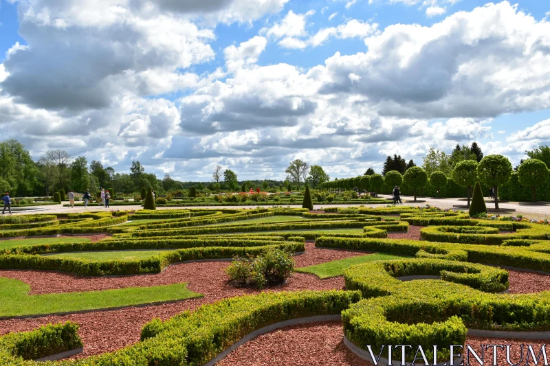 PHOTO Intricate Garden Landscape with Clouds