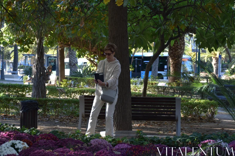 PHOTO Woman in Park with Autumn Foliage