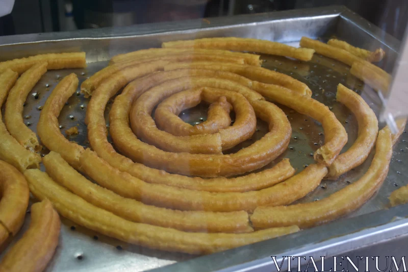 Churros Arranged on Tray Free Stock Photo