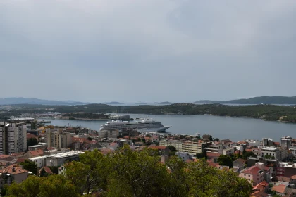 City Harbor with Docked Cruise Ship