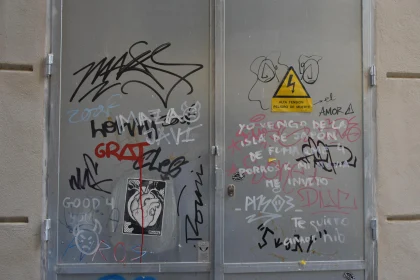 Graffiti and Stickers on Metal Door